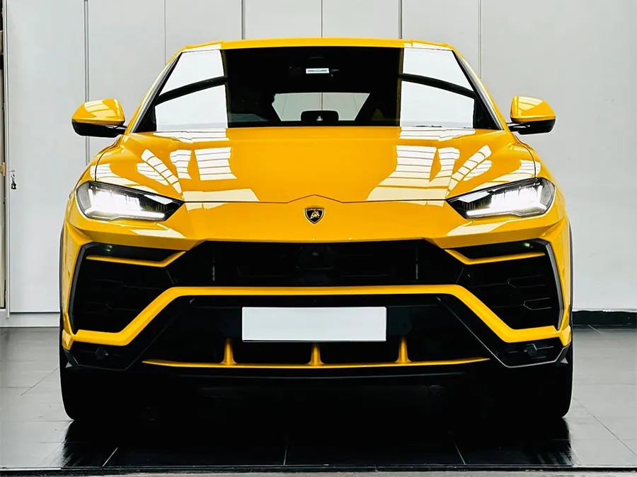 Yellow Lamborghini Urus, front view, at our ECR studio
